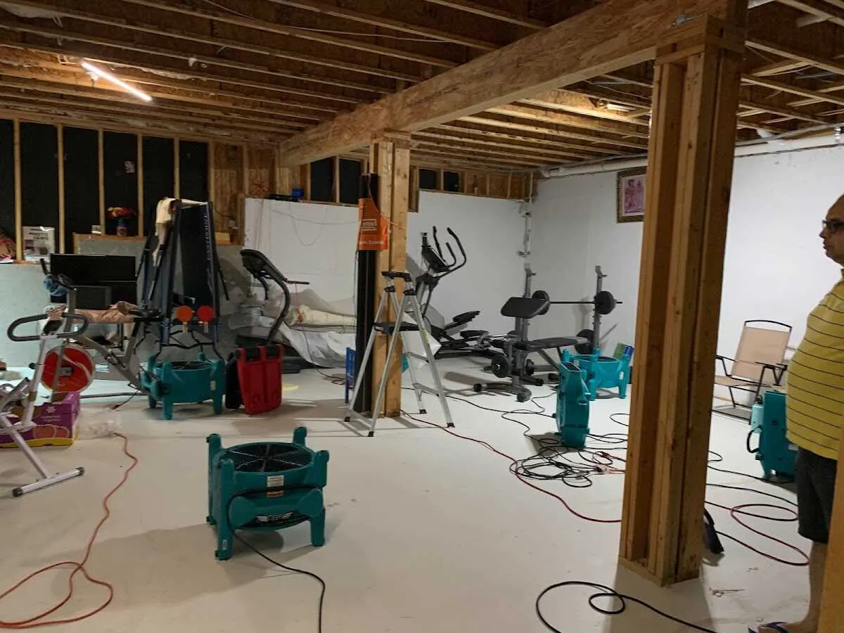 Basement drying equipment setup for Contents Cleaning & Restoration in East Cocalico
